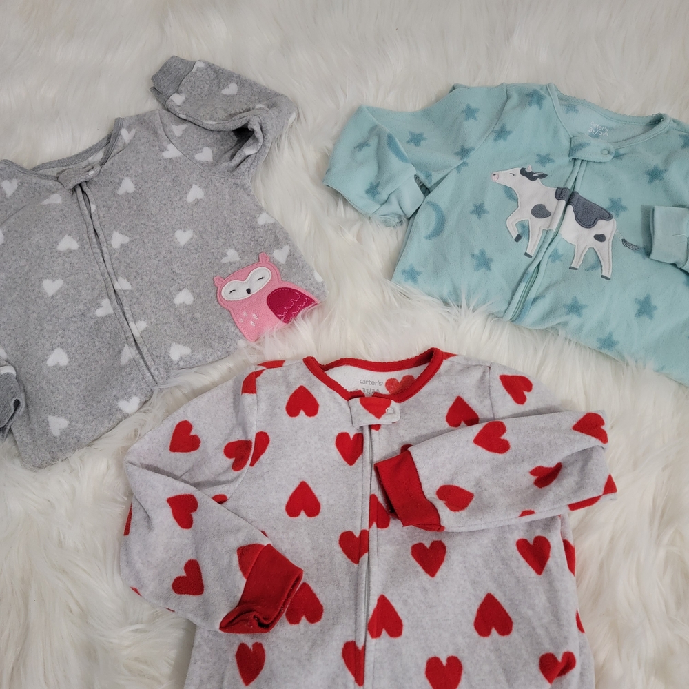 Cozy bundle of 3 fleece baby pajamas, gently used and in good condition. Perfect
